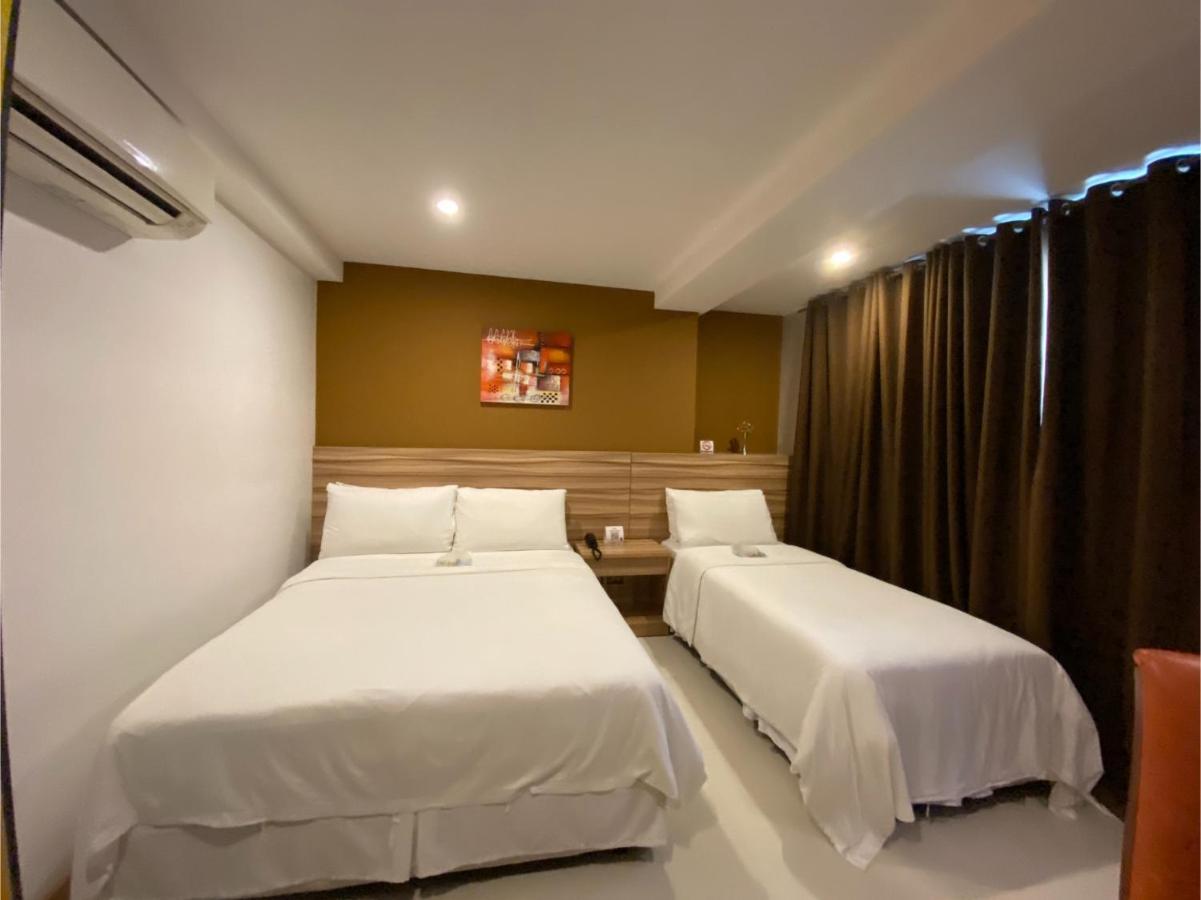 Capital O 820 Guijo Suites Makati Manille Extérieur photo